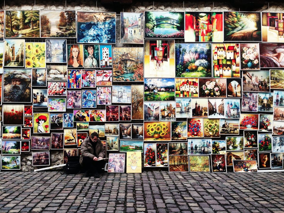 Vendor on street selling artwork